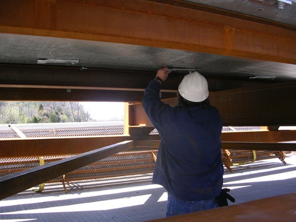 08-clips-attach-deck-to-beams.jpg