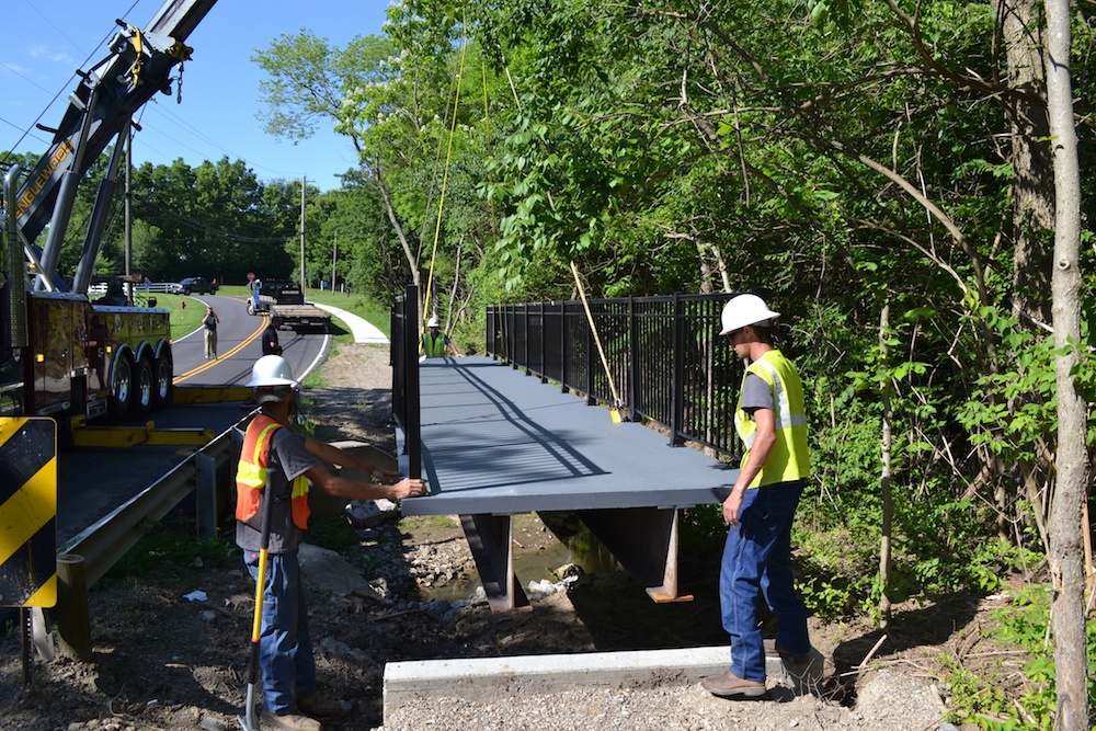 4. Bridge sits on concrete abutment with embedded helical piles..jpg