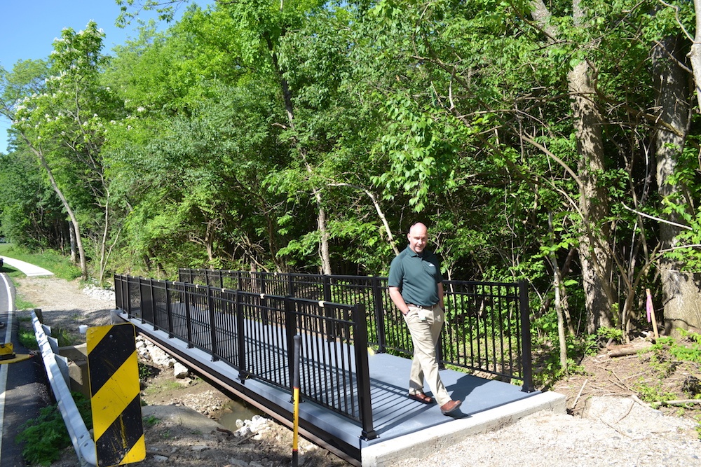 6. The first pedestrian walking across the newly installed bridge..jpg