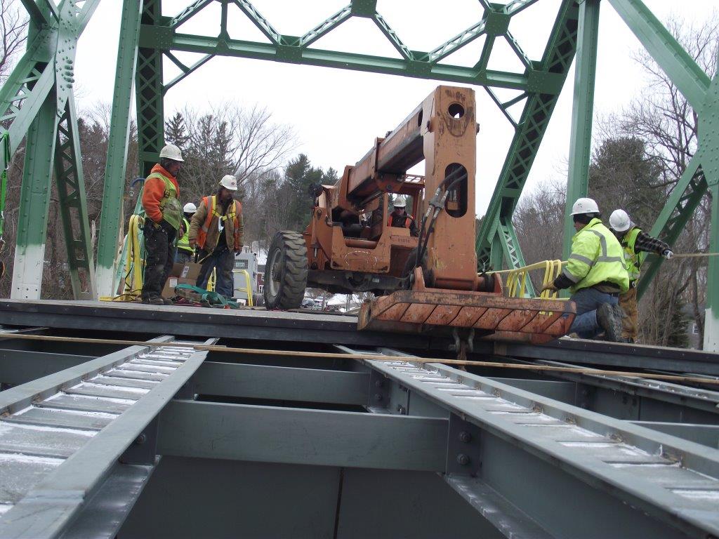 12 TeleHandler Nudging Panel into Final Position