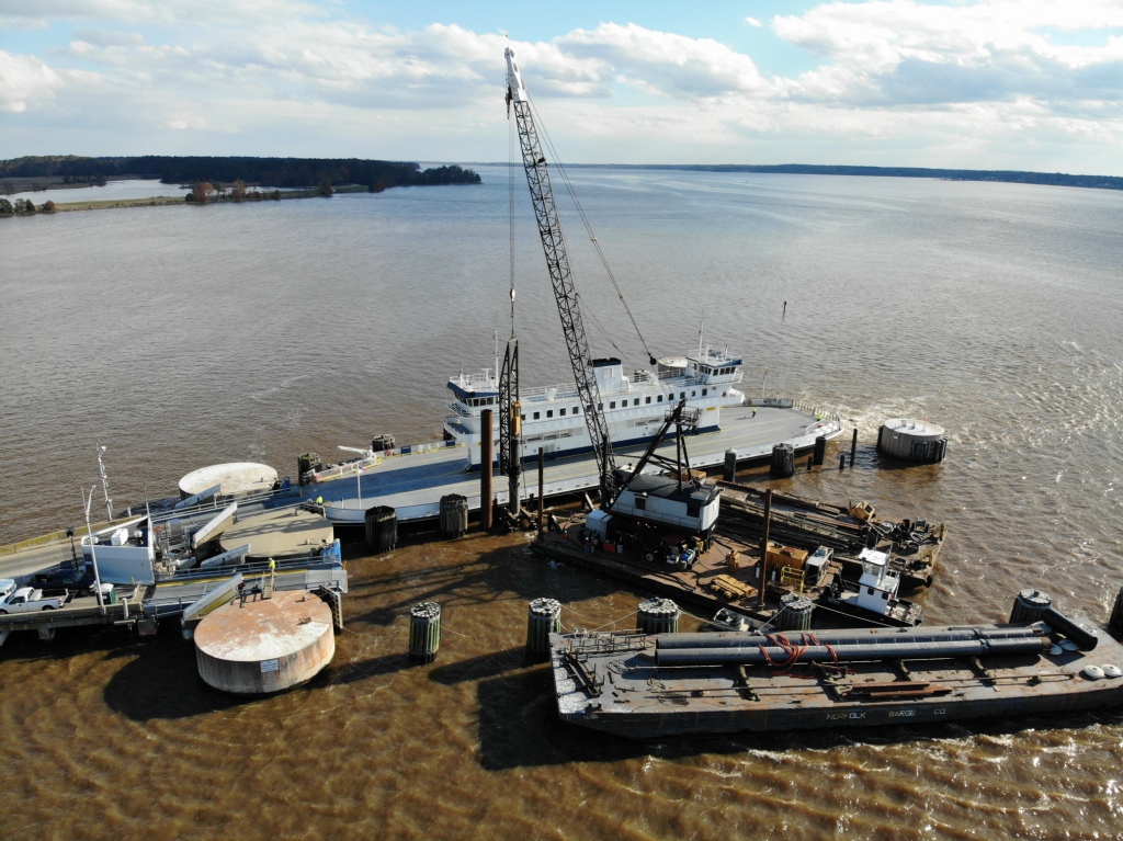 Driving Pile while Ferry docks at terminal