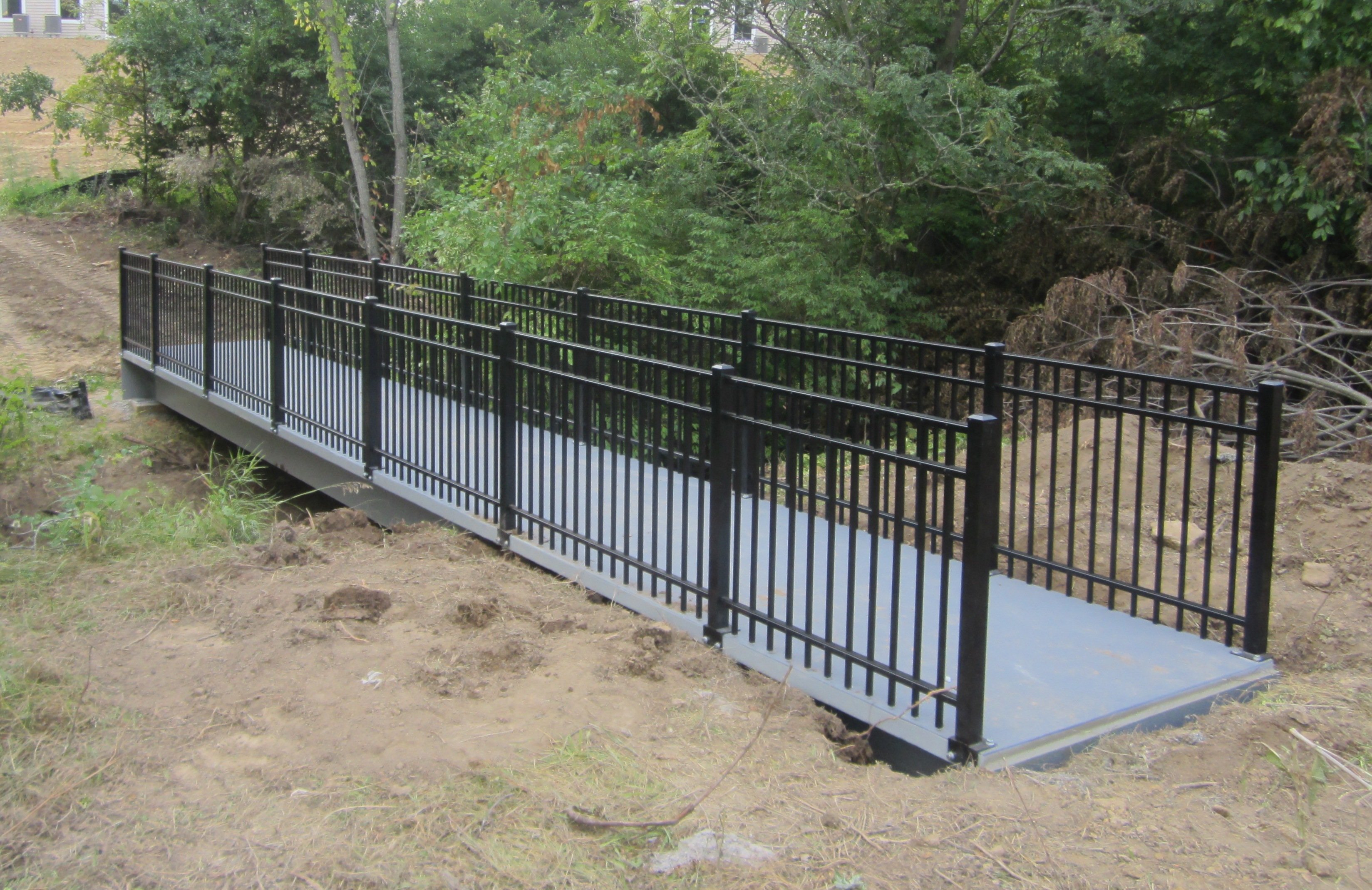 FiberSPAN: A Zero Maintenance Choice for Community Walking Trails